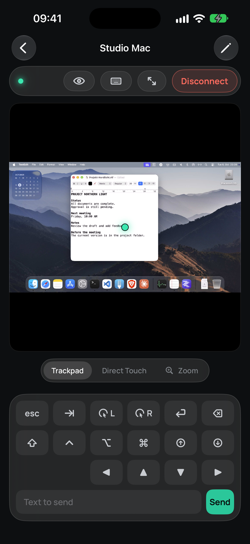 Telkino on iPhone, connected to a Mac: mountain wallpaper, TextEdit and Dock, with trackpad mode and input keys below